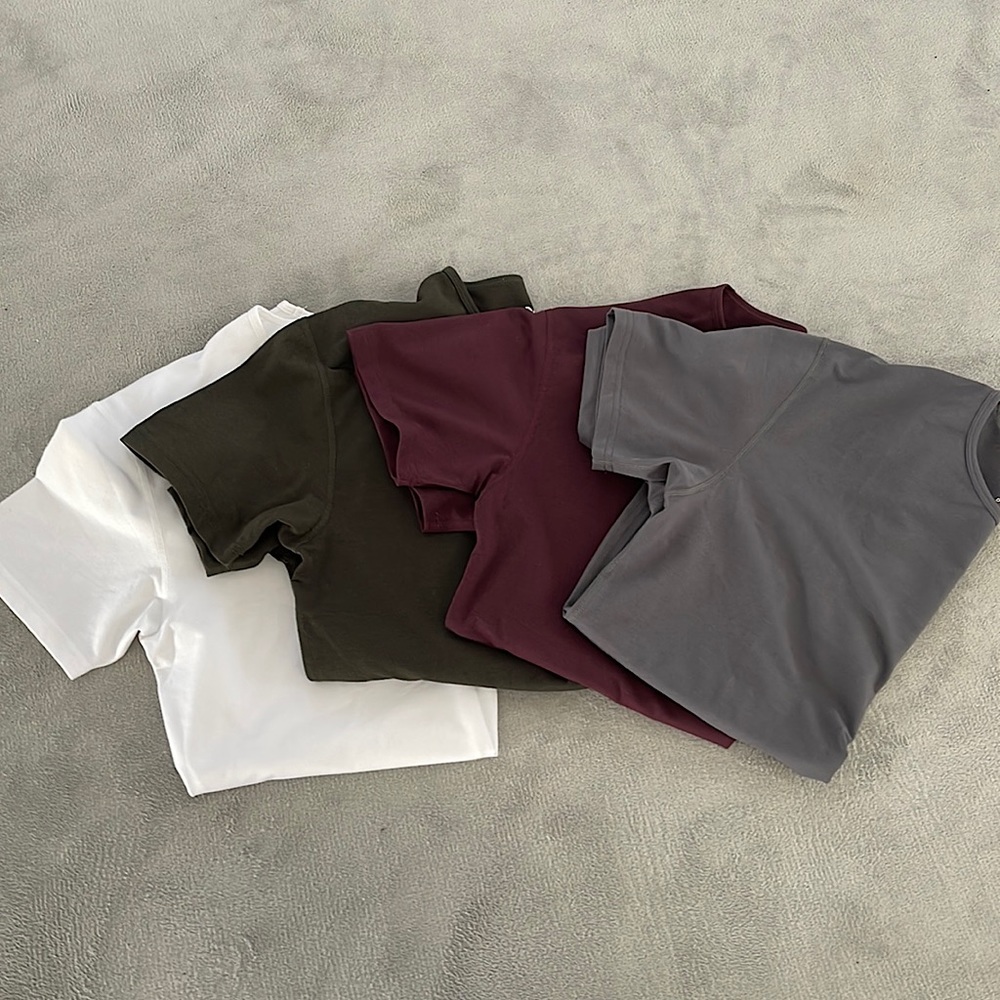 Brand new, never worn. Short sleeve BYLT Drop cut 4 pack